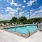 swimming pool with spacious seating areas and reclining chairs